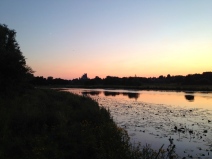 Sunset over the Great Ouse with Ely cathedral in the background