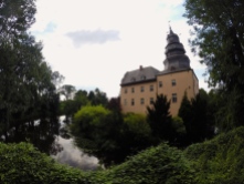 A German castle with a moat.
