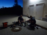 Making camp and Cooking dinner in a Netto supermarket car park with Markus and Norman, two German guys that I cycled with from Landshut, Germany to Krems, Austria.