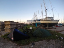 Camping outside the marina where Manfred's boat was moored. Not the best campsite ever but the security guard was very nice to us.
